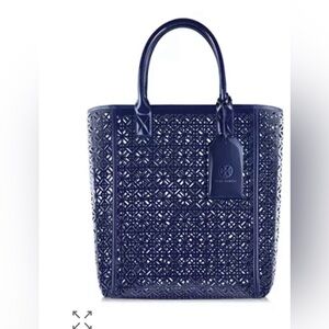 Tory Burch navy perforated laser cut patent leather tote bag